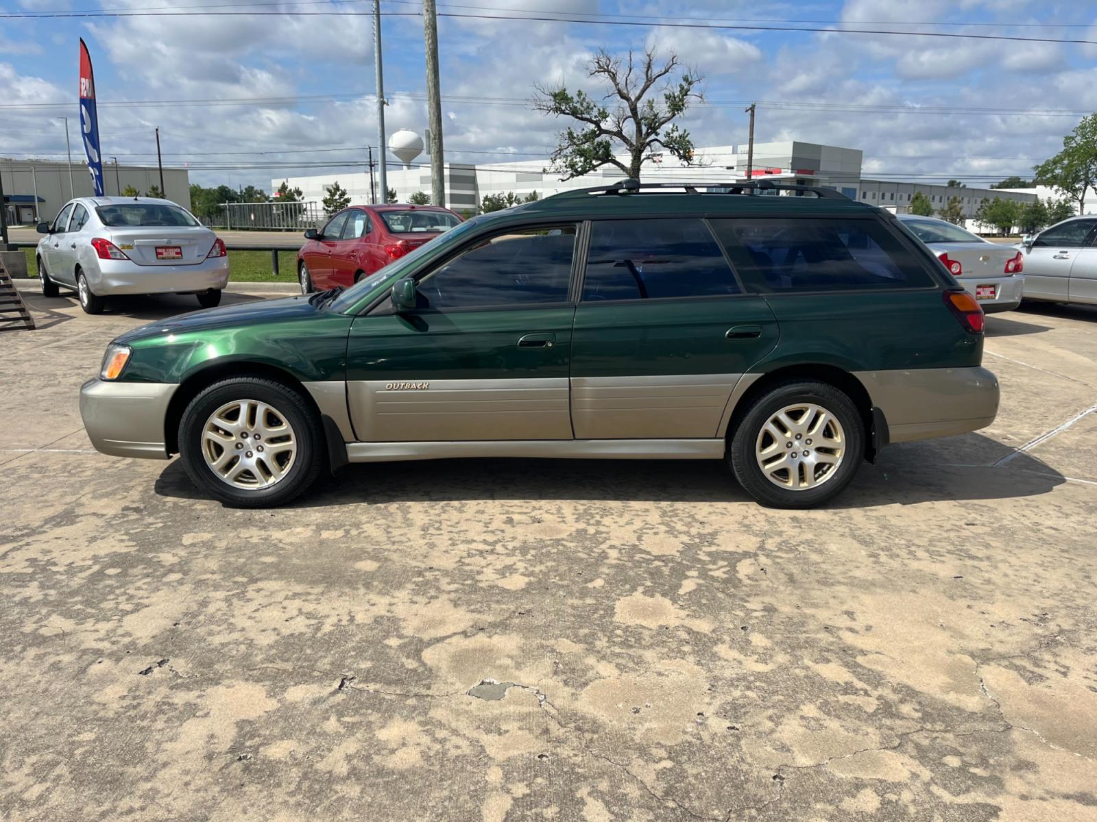 2003 green /TAN Subaru Outback Limited Wagon (4S3BH686737) with an 2.5L H4 SOHC 16V engine, 5-Speed Manual Overdrive transmission, located at 14700 Tomball Parkway 249, Houston, TX, 77086, (281) 444-2200, 29.928619, -95.504074 - Photo #3